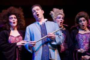Three female students and one male student singing in CSU's 2009 production of The Magic Flute