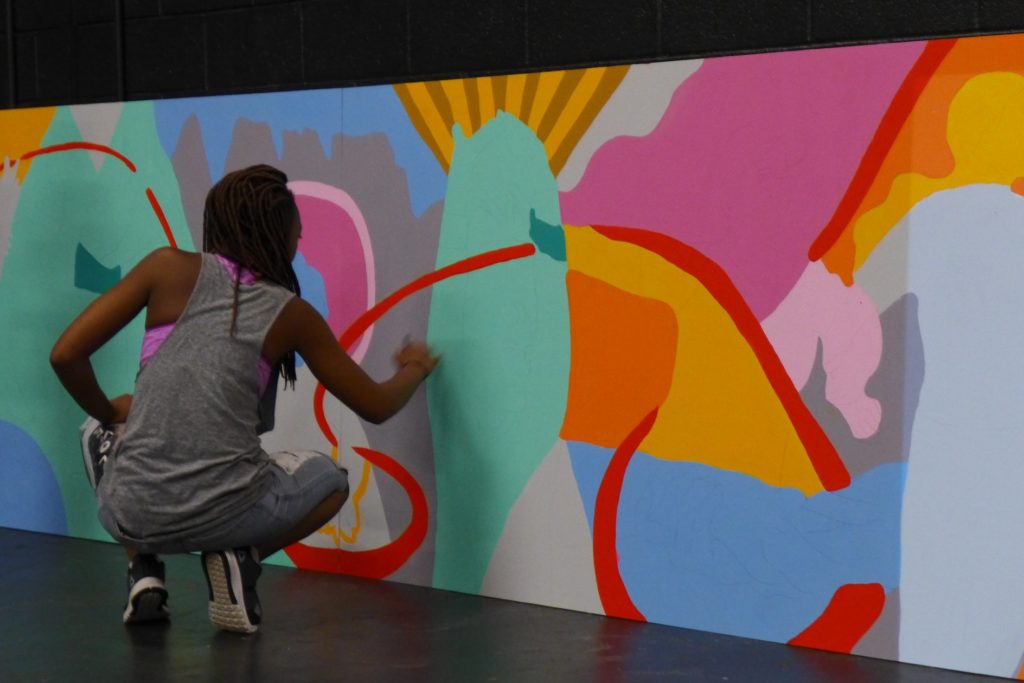 Student painting mural