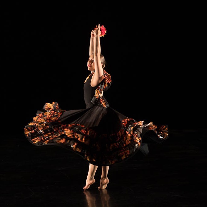 Female dancer performing in Spring 2019 dance concert