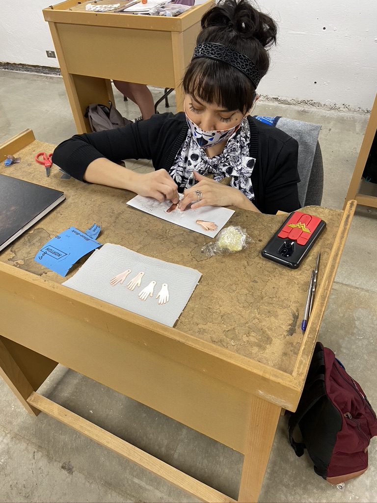 Student working on medals