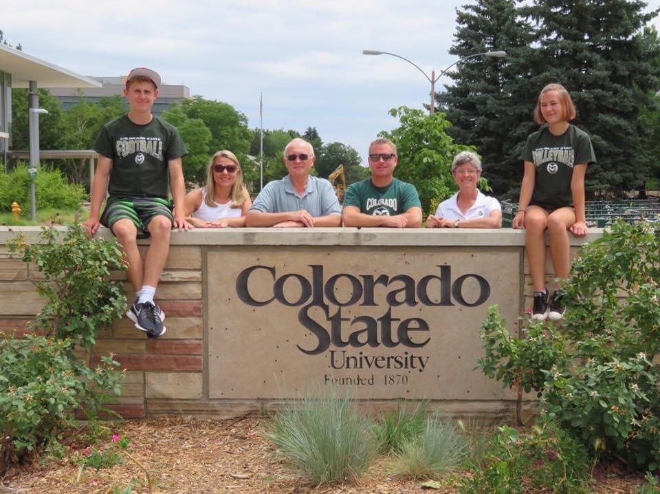 Donn and Linda Hopkins posing with family on the CSU campus near the student center
