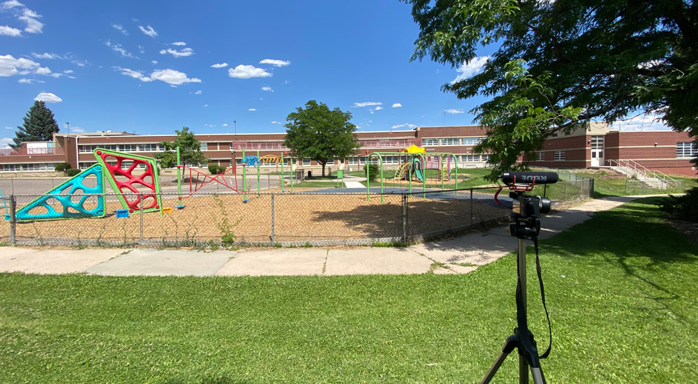 Video camera set up outside a school in West Denver